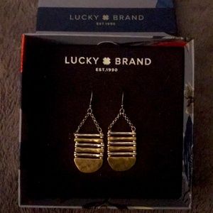 New, in box.  Lucky Brand dangle earrings.